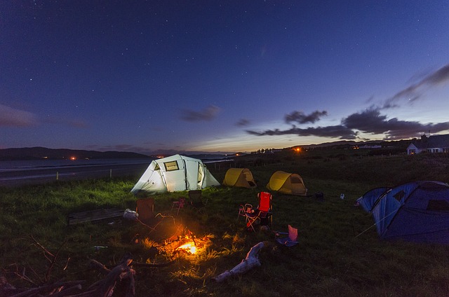 camping in tent with fire